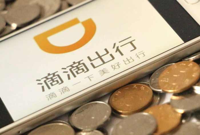 Uber sell to didi in china