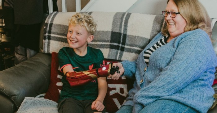 Iron man helps deliver a bionic arm to a 7 year old