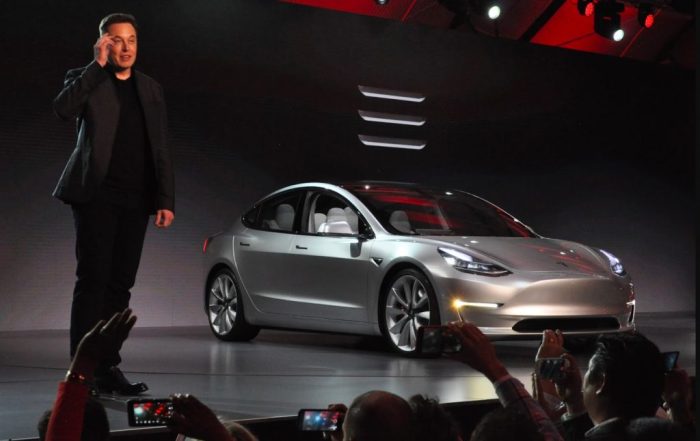 Elon musk tesla charging policy layoffs cuts