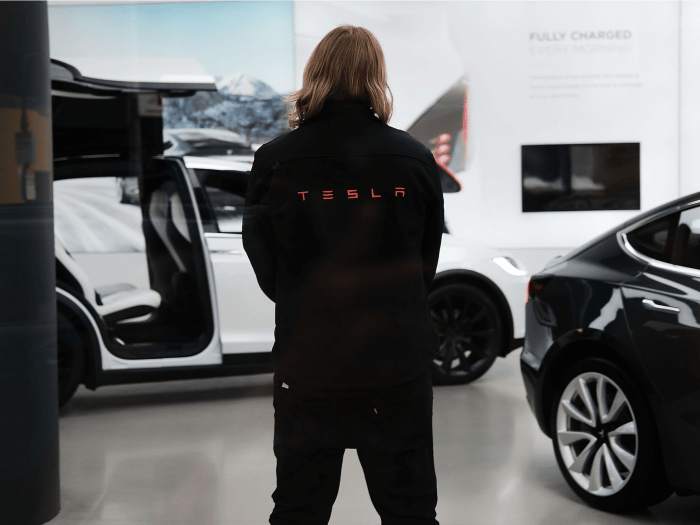 Tesla layoffs workers sales cybertruck cuts